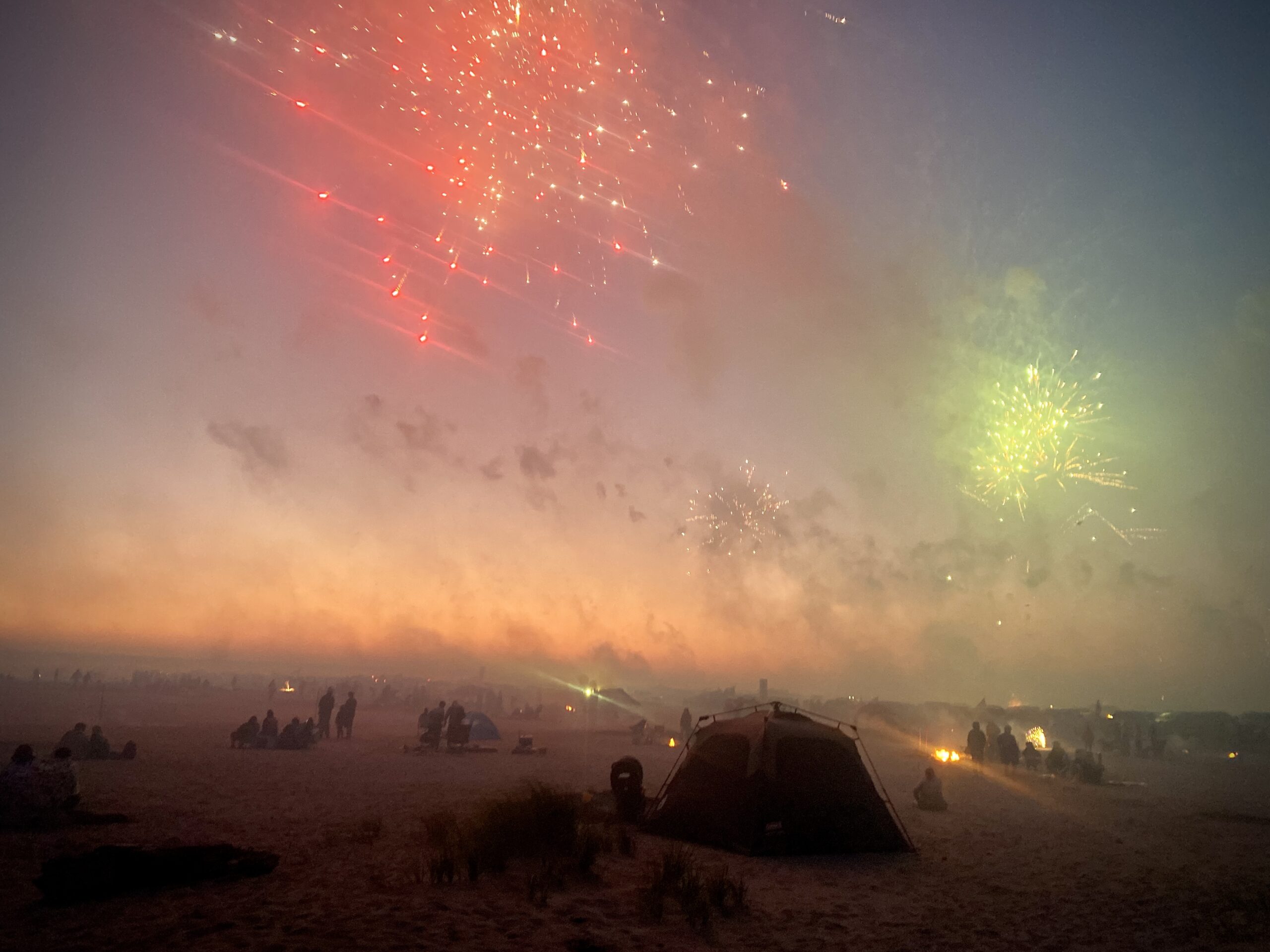 Volunteers cleaning up after Independence Day weekend on a Washington beach